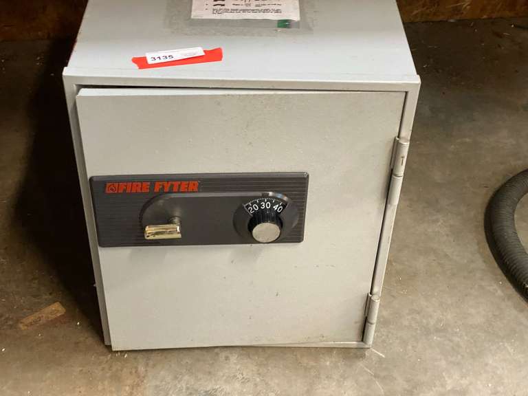 Fire Fyter safe, model C4738, does have combination, see pictures for details. image