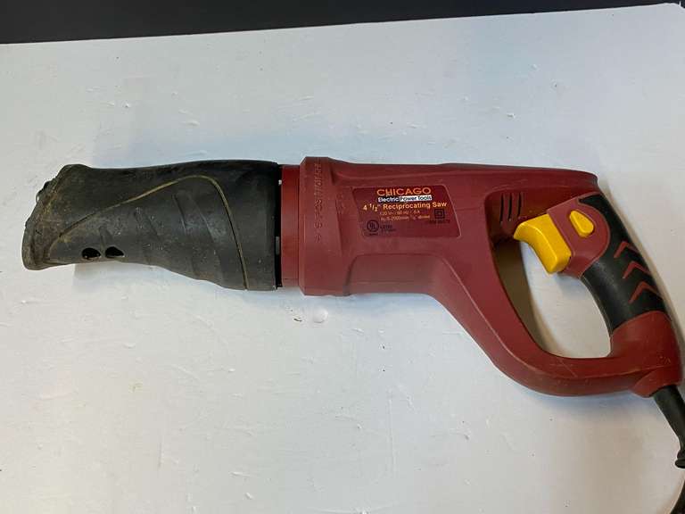 Chicago electric reciprocating saw, powers up, guard is missing, however, it will still hold the blade. See pictures for details. image