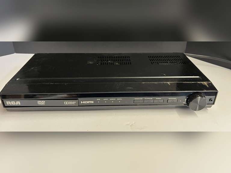 RCA DVD player, powers up, see pictures for details. image