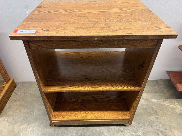 Rolling TV stand, see pictures for details. image