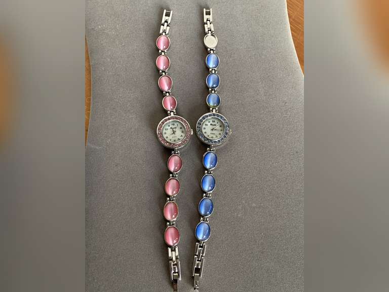 2 BOUCHE BRACELET WATCHES (1 W/ PINK GLASS CAT EYES, 1 W/ BLUE GLASS CAT EYES - MISSING 1 STONE) - CHECKOUT image