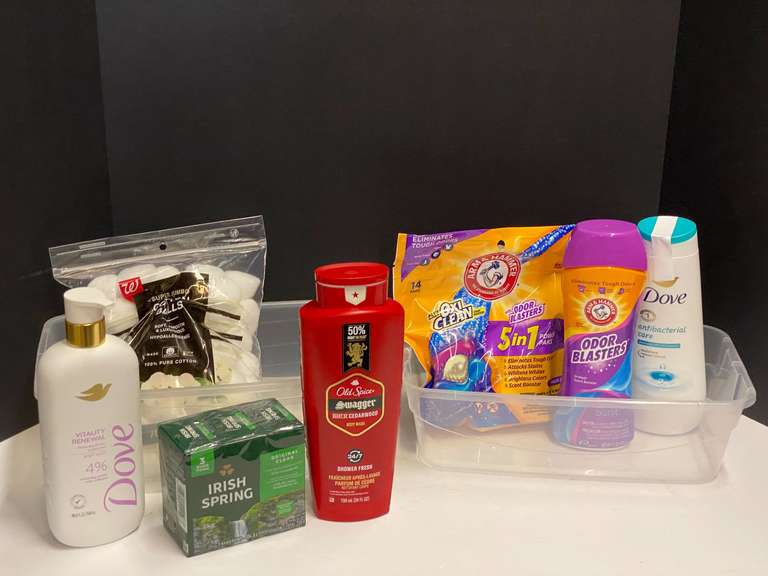 Assorted toiletries to include body wash, bar soap, cotton balls, and more. Tubs are not included, see pictures for details. image