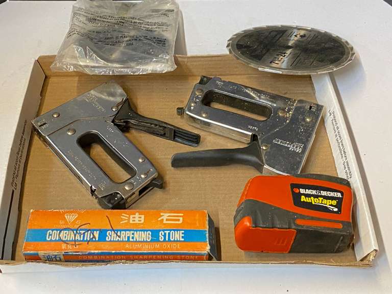 Assorted items to include a sharpening stone, Black & Decker auto tape, sawblades, and more. See pictures for details. image