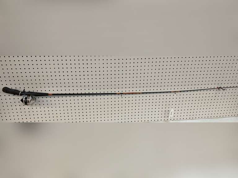 Fishing rod with a Zebco 33 closed reel, see pictures for details. image