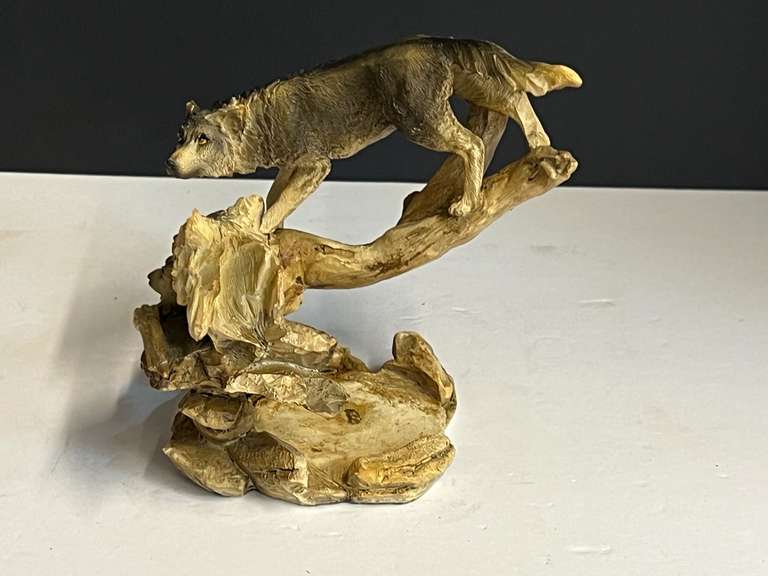 Wolf sculpture, appears to have a place for a small candle, see pictures for details. image