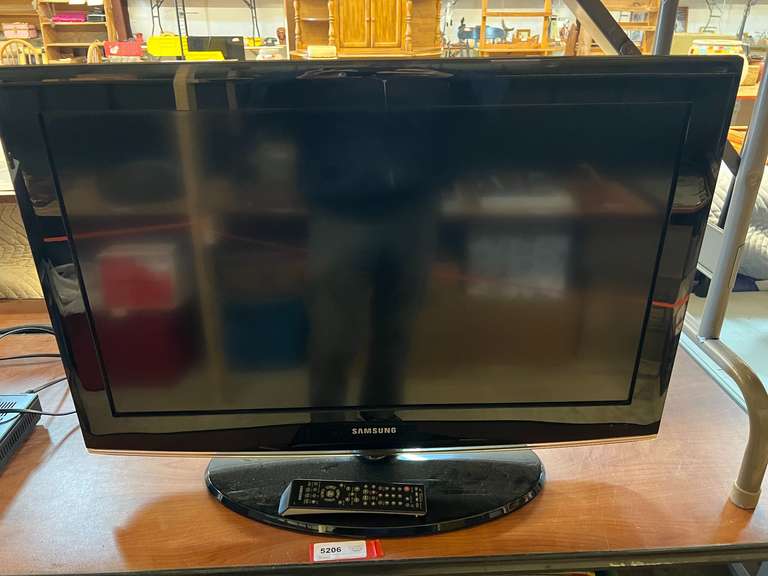 Samsung 32” television with remote, powers up, see pictures for details. image