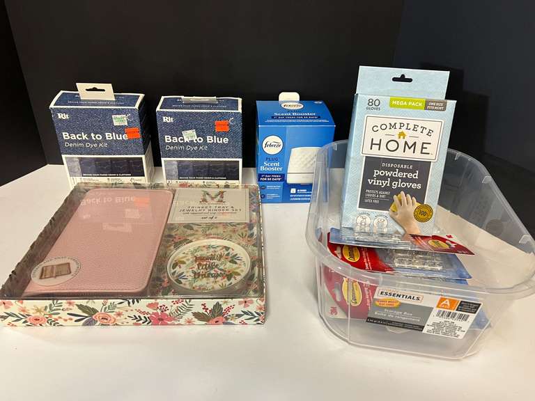 Assorted household items to include a denim die kit, Febreze plug sent booster, powdered vinyl gloves, trinket tray and jewelry binder set, and more. Tub is not included, see pictures for details. image