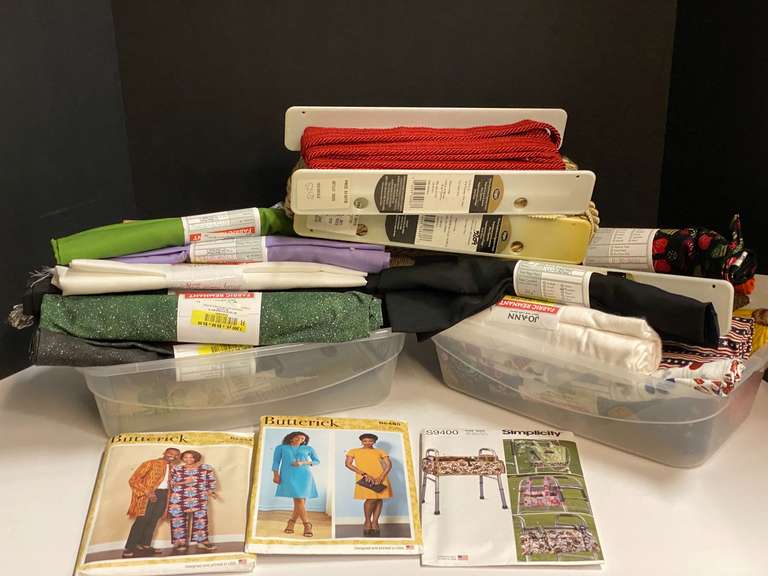 Assortment of fabric remnants, and more. Tubs are not included, see pictures for details. image