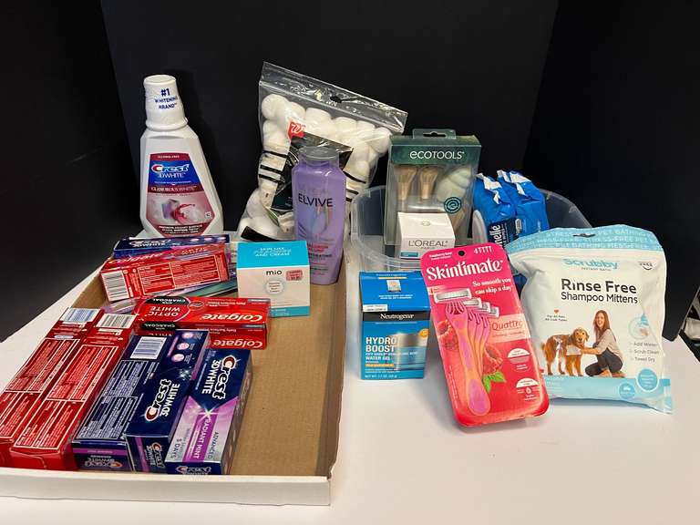 Assorted toiletries to include mouthwash, Cottonelle wipes, L’Oreal Rivitalift moisturizer, toothpaste, and more. Tub is not included, see pictures for details. ￼ image