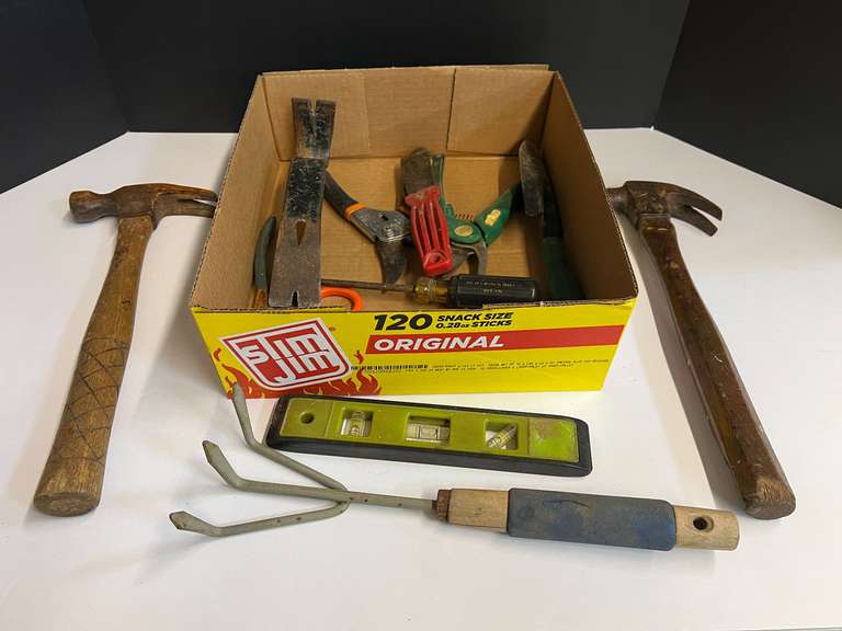 Assorted hand tools to include hammers, flat bar, screwdriver, small garden hand tools, and more. See pictures for details. image