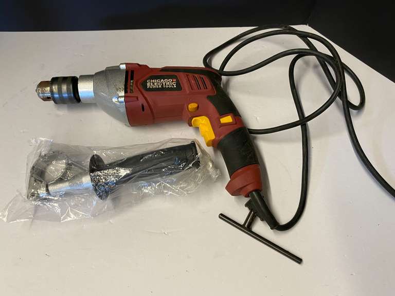 Chicago electric 1/2” hammer drill, powers up, see pictures for details. image