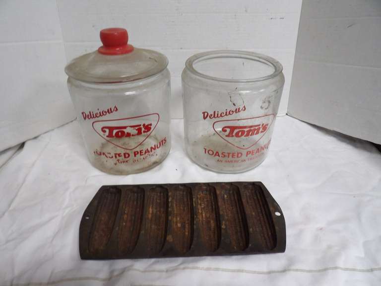 TWO VINTAGE TOM'S JARS AND CAST IRON CORNPONE MOLD image