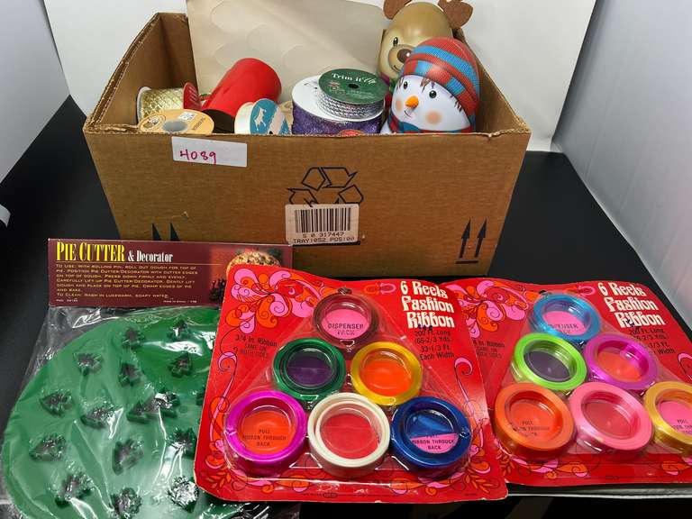 Assorted Christmas ribbon, Christmas themed pie cutter and decorator, and more. See pictures for details. image