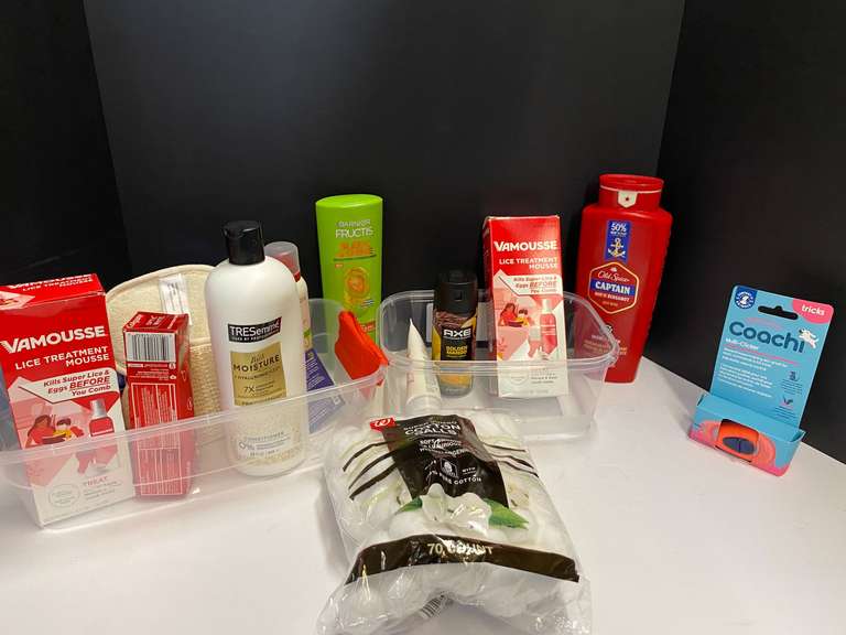 Shelf lot of assorted toiletries marked 6114 to include shampoo, conditioner, total body deodorant, body wash, and more. Tubs are not included, see pictures for details. image