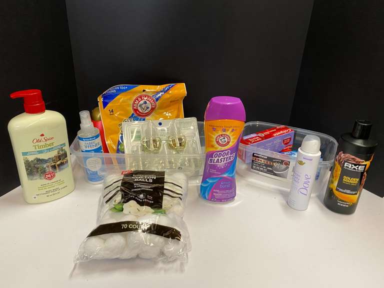 Shelf lot marked 6116 of assorted toiletries to include Axe body wash, toothpaste, whole body deodorant, cotton balls, and more. Tubs are not included, see pictures for details. image