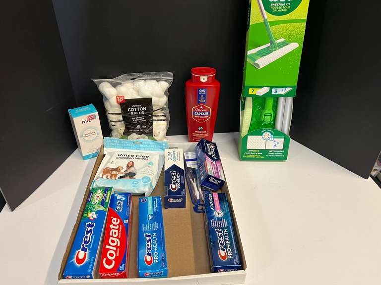 Assorted household items to include a swiffer dry plus wet sweeping kit, body wash, toothpaste, and more. See pictures for details. image