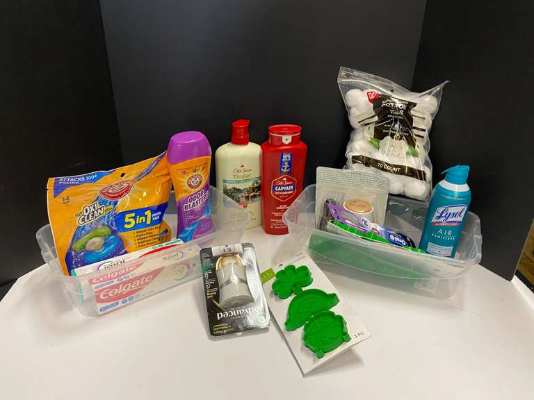 Shelf lot marked 6120 of assorted toiletries to include body wash, toothpaste, toothbrushes, Lysol air sanitizer, and more. Tubs are not included, see pictures for details. ￼ image