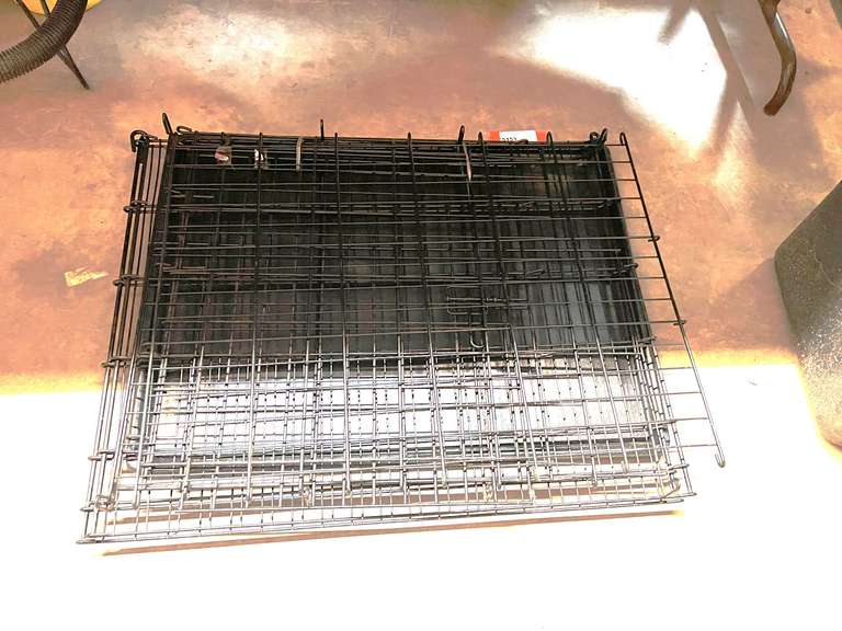 Folding animal cage, also includes a large storage bin, see pictures for details. image