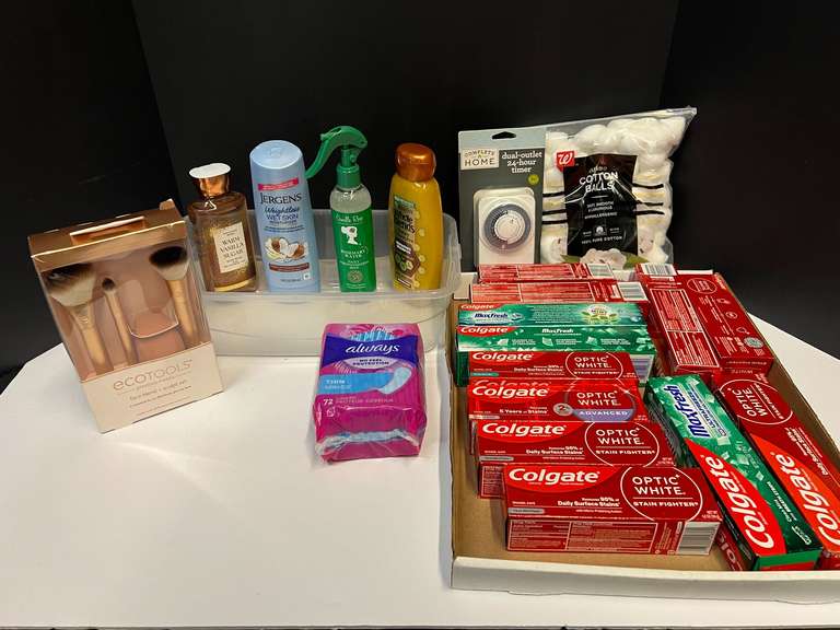 Assorted toiletries to include toothpaste, cotton balls, moisturizer, timer, and more. Tub is not included, see pictures for details. ￼ image