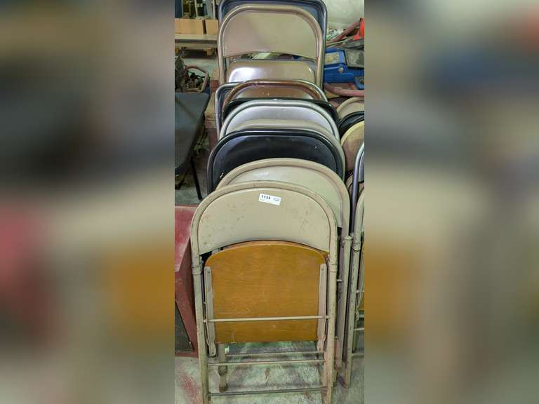 ROW OF METAL FOLDING CHAIRS MARKED 1134 image