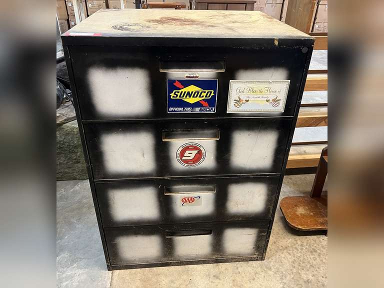 Four drawer metal file cabinet with drawer dividers, see pictures for details. image