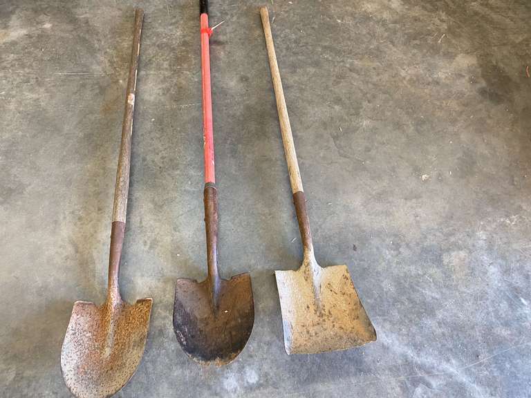 Shovels, three pieces, includes two spade shovels and a flat shovel, see pictures for details. image