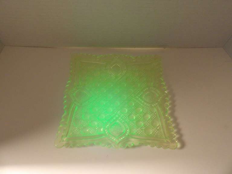 VINTAGE URANIUM GREEN GLASS, DAISY AND BUTTON SHIELD PATTERN DISH UV REACTIVE image