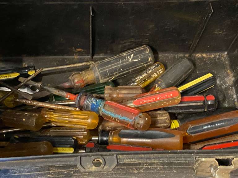 Toolbox with content, mostly screwdrivers, see pictures for details. image