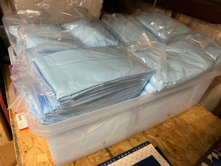 Protective bed pads, tub is not included, approximately 13 packs of five each, see pictures for details. image