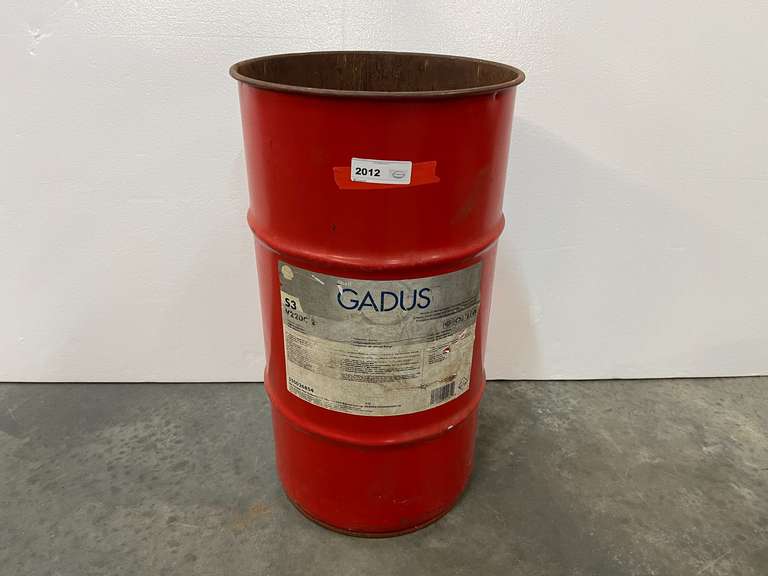 Small round metal barrel, see pictures for details. image