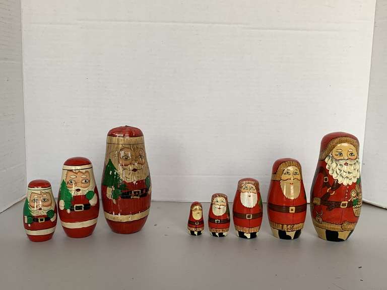 2 WOODEN SANTA NESTING DOLLS image