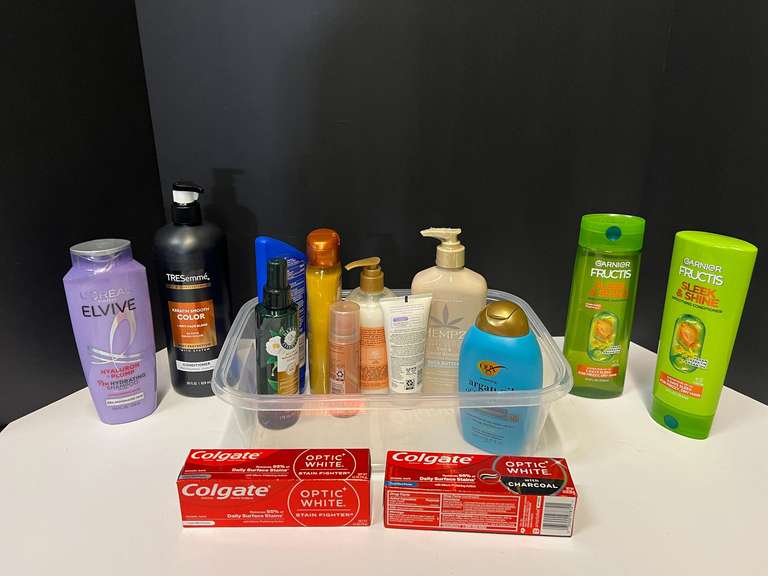 Assorted toiletries to include toothpaste, conditioner, shampoo, sunscreen, and more. Tub is not included, see pictures for details. ￼ image
