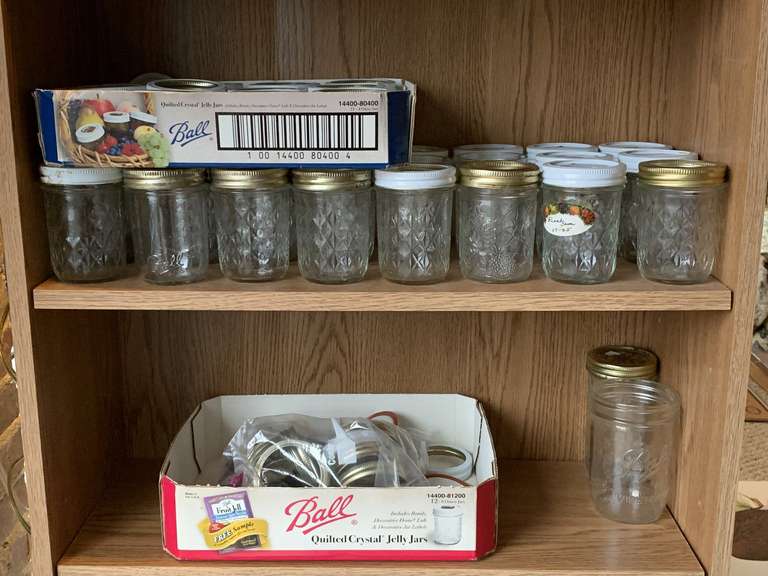 2 SHELVES OF JELLY JARS & LIDS image