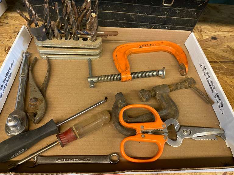 Assorted hand tools to include drillbits, pliers, ratchet, C-clamps, and more. See pictures for details. image