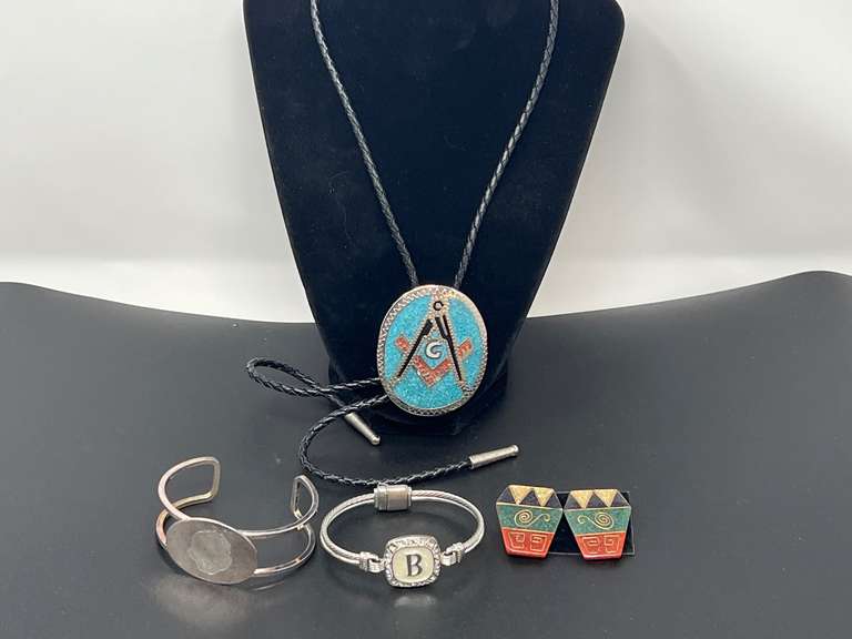 Fashion estate jewelry to include decorative cuff bracelets, Masonic bolo tie, and earrings. See pictures for details. image