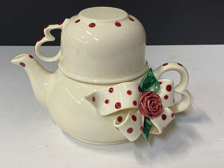 Mud Pie teapot and cup, white ceramic with red polka dot bow and rose, pot, lid and cup, see pictures for details. image