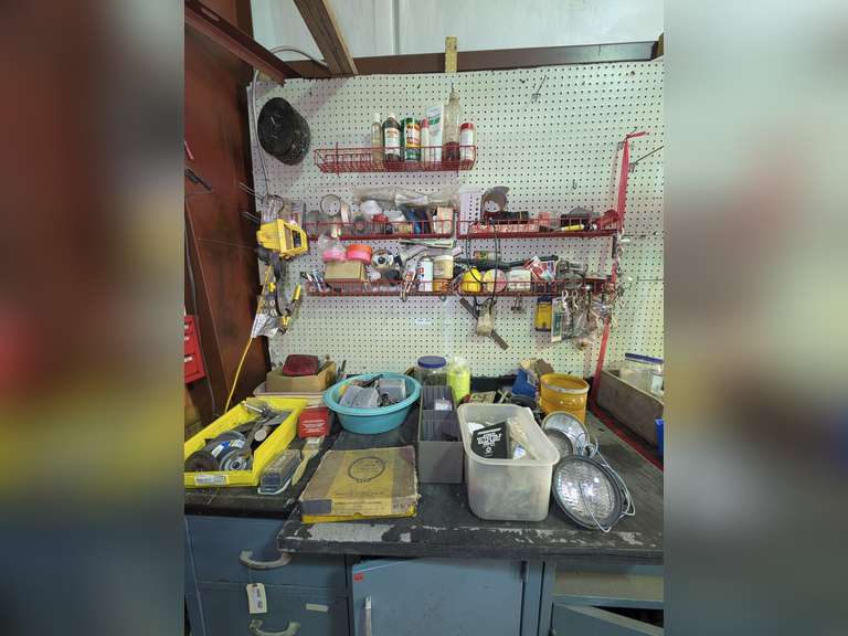 CONTENTS OF COUNTERTOP AREA AND HANGING ON PEGBOARD ABOVE MARKED 1040 INCLUDING TOOLS, TRAILER LIGHT, WELL PUMP PRESSURE SWITCHES, VINTAGE OFF-ROAD VEHICLE SPOTLIGHTS, CLAMP ON SHOP LIGHT, AND MORE image