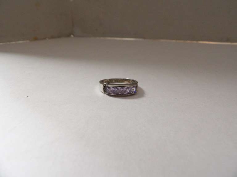 STERLING SILVER RING SIZE 8 1/2 WITH LIGHT PURPLE STONES image