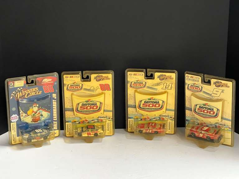 Four NASCAR diecast replicas, 1/64 scale, still in original packaging, tub is not included, see pictures for details. image