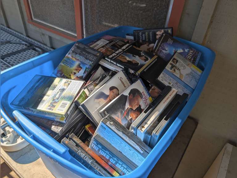 LARGE TUB FILLED WITH DVD MOVIES image