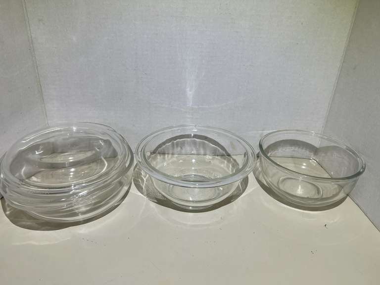 KIT...Small clear glass nesting bowls, two pieces, also includes a small Pyrex casserole/refrigerator dish with lid, see pictures for details. image