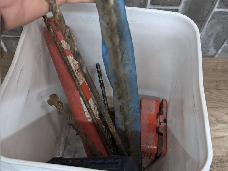 BUCKET FILLED WITH EXTRA LONG LARGE SIZE DRILL BITS, MASONRY BITS, DRILL BIT INDEX BOXES, AND MORE image
