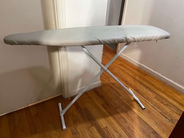 BR2… Ironing board with over the door hanger, see pictures for details. image