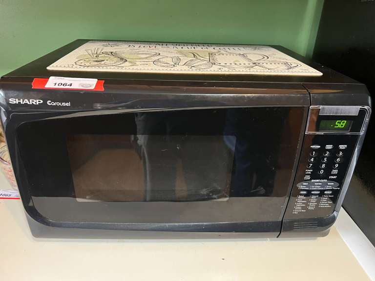 KIT… Sharp carousel microwave, powers up, see pictures for details. image