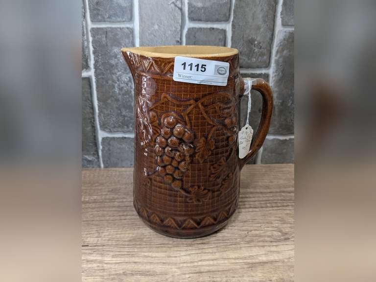 ANTIQUE NORTH STAR POTTERY BROWN SALT-GLAZED STONEWARE PITCHER FEATURING A RAISED "GRAPE AND TRELLIS" image