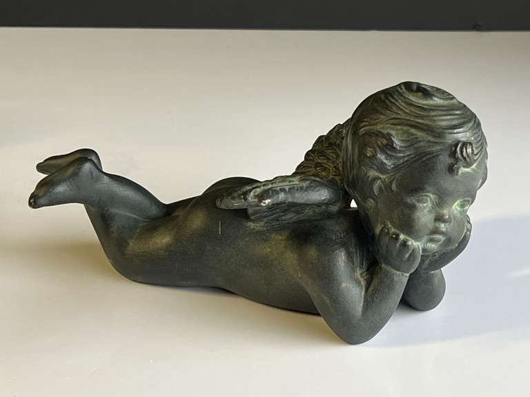 Garage… Ceramic cherub figurine, see pictures for details. image
