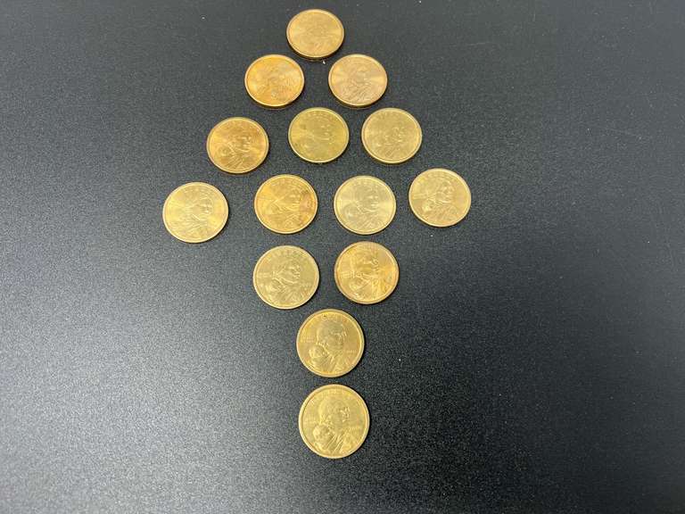 Collectible Sacajawea dollar coins, 13 pieces, also includes a 2010 Sacajawea one dollar coin, “Haudenosaunee Great Law of Peace," depicts a bundle of five arrows, symbolizing the unity of the five nations of the Iroquois Confederacy. see pictures for details. image