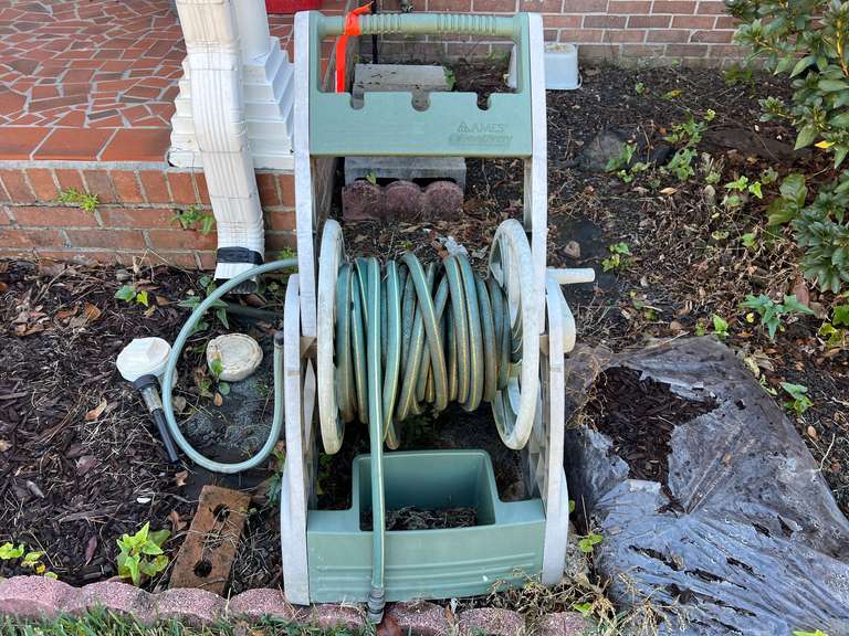 Front yard…Ames hose reel with hose, see pictures for details. image