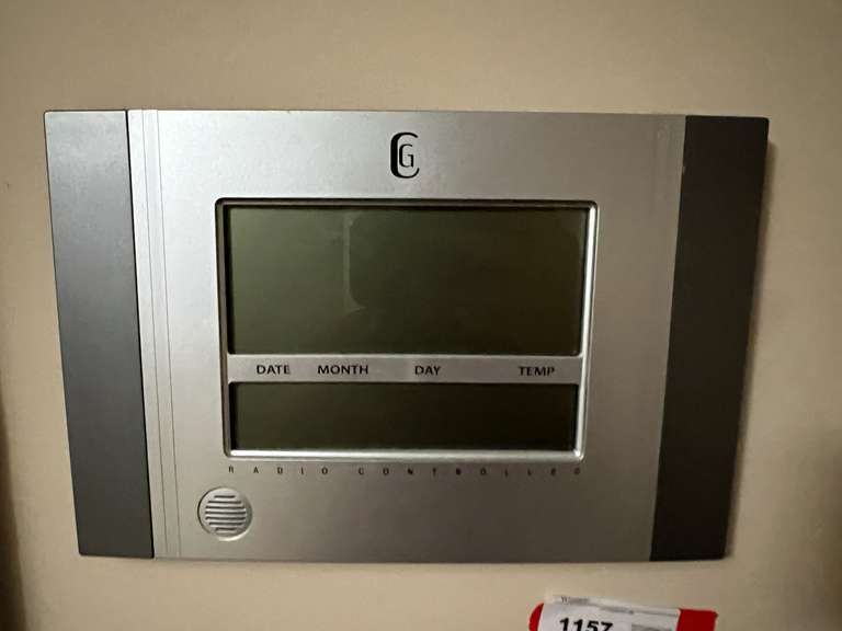 Master… Radio controlled digital clock, working condition unknown, see pictures for details. image