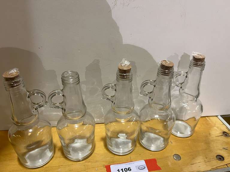 Small glass storage bottles, with handles, set of five, see pictures for details. image